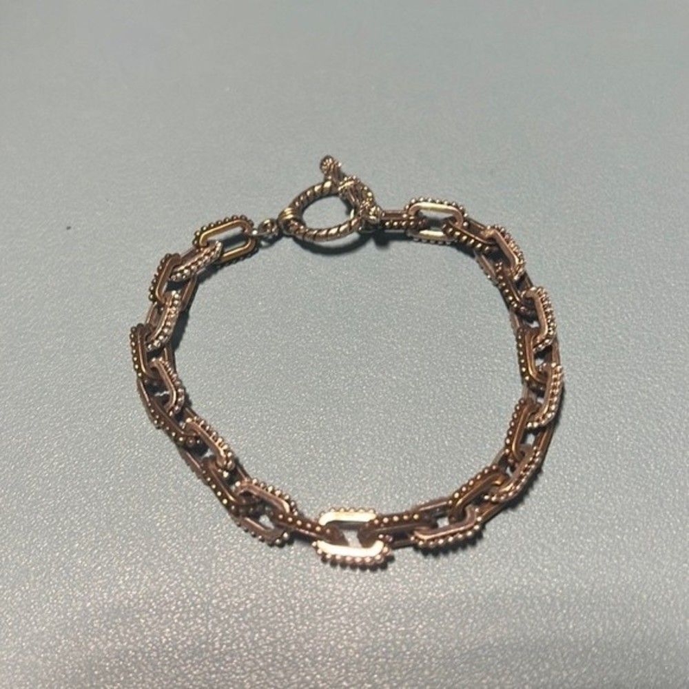 Handcrafted silver and antique gold tone link bracelet